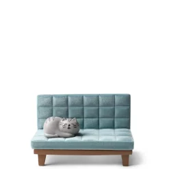 A cat on a sofa figurine is also a phone stand by Decole Japan.