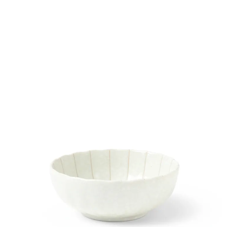 Kasa parasol lines make a simple elegant design for this ceramic bowl made in Japan available at Miya.