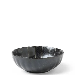 Kasa parasol lines make a simple elegant design for this ceramic bowl made in Japan available at Miya.